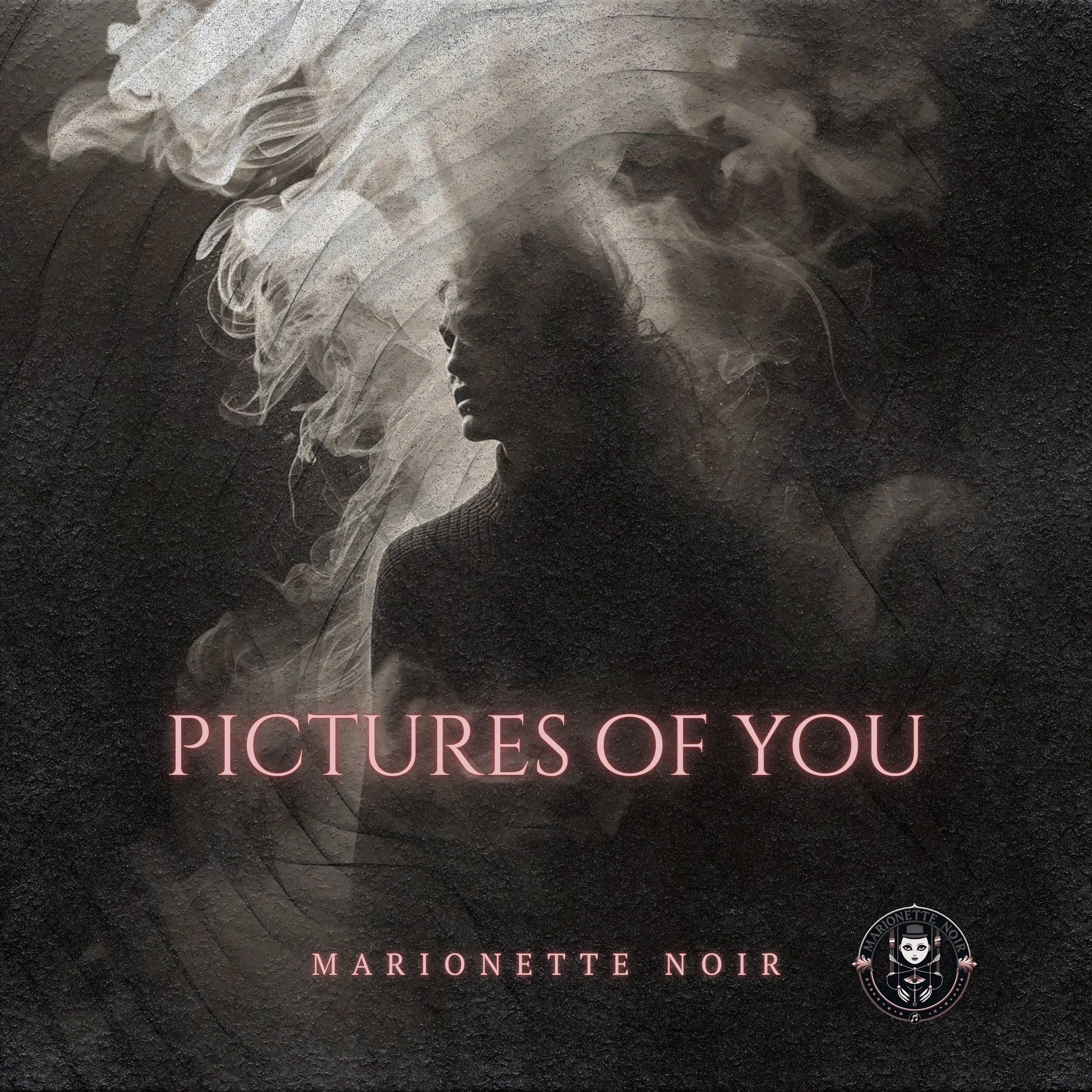 Album cover for "Pictures of You" by Marionette Noir featuring a shadowed silhouette fading into a textured ethereal haze with pink typography.